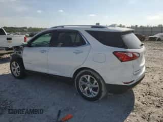 2018 Chevrolet Equinox Premier с VIN 3GNAXPEU1JL164020, выставлен на аукционе Copart как лот 84580105 с пробегом 52 219 миль миль и Списание • Salvage title. История ставок и продаж доступна на DreamBid. Изображение 2.