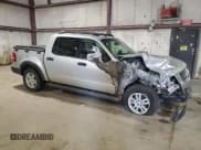 ✅ 2010 Ford Explorer Sport Trac XLT • VIN: 1FMEU5BE5AUF03013 • Лот: 67212825. Опубликован ранее на Copart с пробегом 129 668 миль. Бесплатный доступ к архиву аукционных продаж из США и подробный отчёт об истории автомобиля на DreamBid. Изображение 4.