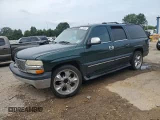 2001 Chevrolet Suburban LS z VIN 3GNEC16T61G235835, wystawiony jako Copart lot #65178375 z przebiegiem 401 920 mil mil oraz Szkoda całkowita • Salvage title. Historia ofert i sprzedaży dostępna na DreamBid. Obrazek 1.