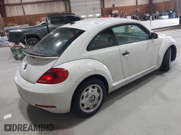✅ 2015 Volkswagen Beetle Fleet Edition • VIN: 3VWF17AT0FM601159 • Lot: 42127817. Listed on IAAI with 129,117 mi. Free auction sales archive from the USA and detailed vehicle history report at DreamBid. Image 4.
