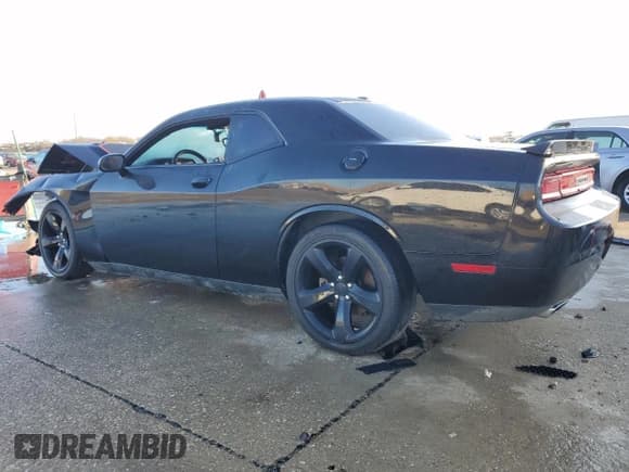 ✅ 2013 Dodge Challenger R/T • VIN: 2C3CDYBTXDH616253 • Lot: 86608804. Wystawiony na Copart z przebiegiem 193 923 mil. Bezpłatny archiwum sprzedaży aukcyjnych z USA i szczegółowy raport historii pojazdu na DreamBid. Zdjęcie 2.