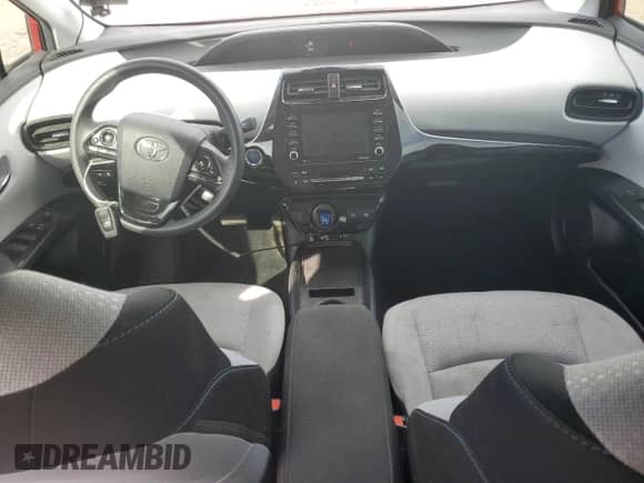 2022 Toyota Prius L Eco с VIN JTDKAMFU4N3190236, выставлен на аукционе Copart как лот 64240135 с пробегом 77 809 миль миль и Списание • Salvage title. История ставок и продаж доступна на DreamBid. Изображение 8.