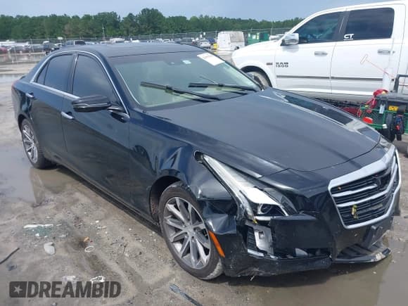 ✅ 2016 Cadillac CTS Luxury Collection AWD • VIN: 1G6AX5SX8G0111030 • Лот: 42949328. Опубликован ранее на IAAI с пробегом 136 835 миль. Бесплатный доступ к архиву аукционных продаж из США и подробный отчёт об истории автомобиля на DreamBid. Изображение 1.