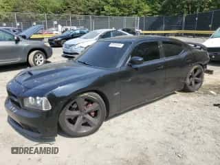 2008 Dodge Charger SRT-8 с VIN 2B3LA73W28H150316, выставлен на аукционе Copart как лот 69149244 с пробегом 96 723 миль миль и Списание • Salvage title. История ставок и продаж доступна на DreamBid. Изображение 1.