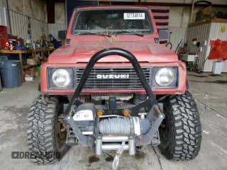 ✅ 1987 Suzuki Samurai • VIN: JS4JC51C1H4193858 • Lot: 74391394. Wystawiony na Copart z przebiegiem 53 168 mil. Bezpłatny archiwum sprzedaży aukcyjnych z USA i szczegółowy raport historii pojazdu na DreamBid. Zdjęcie 5.