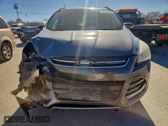 ✅ 2015 Ford Escape Titanium • VIN: 1FMCU0J98FUC32373 • Lot: 94688845. Wystawiony na Copart z przebiegiem 154 096 mil. Bezpłatny archiwum sprzedaży aukcyjnych z USA i szczegółowy raport historii pojazdu na DreamBid. Zdjęcie 5.