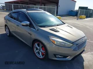 ✅ 2015 Ford Focus Titanium • VIN: 1FADP3J26FL341446 • Lot: 43416500. Listed on IAAI with 197,507 mi. Free auction sales archive from the USA and detailed vehicle history report at DreamBid. Image 1.