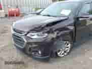 2020 Chevrolet Traverse LT with VIN 1GNEVHKWXLJ319645, listed as a IAAI auction lot 43330855 with 131,084 mi miles and . Bid and sale history available at DreamBid. Image 6.