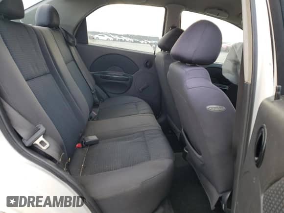 2006 Chevrolet Aveo LS z VIN KL1TD56626B536706, wystawiony jako Copart lot #82291234 z przebiegiem Nie podano mil oraz Szkoda całkowita • Salvage title. Historia ofert i sprzedaży dostępna na DreamBid. Obrazek 10.