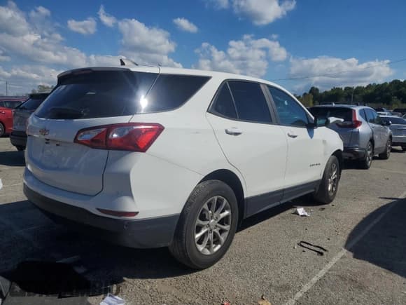 ✅ 2020 Chevrolet Equinox LS • VIN: 2GNAX5EV0L6182187 • Lot: 86251855. Wystawiony na Copart z przebiegiem 96 452 mil. Bezpłatny archiwum sprzedaży aukcyjnych z USA i szczegółowy raport historii pojazdu na DreamBid. Zdjęcie 3.