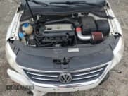 ✅ 2010 Volkswagen CC Sport • VIN: WVWNP7AN8AE553083 • Lot: 81366344. Listed on Copart with 154,684 mi. Free auction sales archive from the USA and detailed vehicle history report at DreamBid. Image 12.