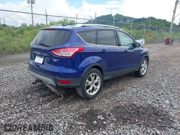 ✅ 2013 Ford Escape Titanium • VIN: 1FMCU9J99DUB81449 • Lot: 42530624. Listed on IAAI with 149,462 mi. Free auction sales archive from the USA and detailed vehicle history report at DreamBid. Image 4.
