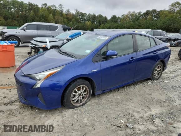 2018 Toyota Prius Two z VIN JTDKBRFU3J3595637, wystawiony jako Copart lot #90105975 z przebiegiem 257 844 mil mil oraz Czysty tytuł • Clean title. Historia ofert i sprzedaży dostępna na DreamBid. Obrazek 1.