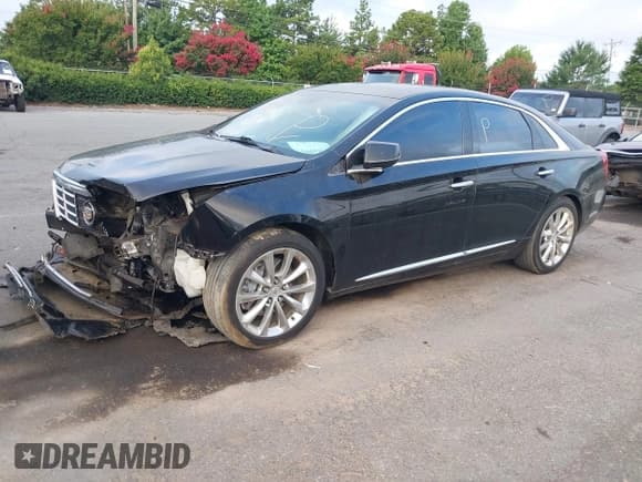 ✅ 2013 Cadillac XTS Premium • VIN: 2G61T5S36D9124966 • Лот: 42754250. Опубликован ранее на IAAI с пробегом 193 099 миль. Бесплатный доступ к архиву аукционных продаж из США и подробный отчёт об истории автомобиля на DreamBid. Изображение 2.