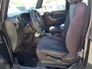 ✅ 2013 Jeep Wrangler Sport • VIN: 1C4AJWAGXDL704002 • Lot: 85896725. Wystawiony na Copart z przebiegiem 166 893 mil. Bezpłatny archiwum sprzedaży aukcyjnych z USA i szczegółowy raport historii pojazdu na DreamBid. Zdjęcie 7.