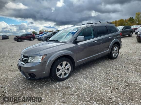 2012 Dodge Journey R/T z VIN 3C4PDDFG5CT227058, wystawiony jako Copart lot #82669855 z przebiegiem 126 764 mil mil oraz Czysty tytuł • Clean title. Historia ofert i sprzedaży dostępna na DreamBid. Obrazek 1.