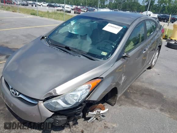 2013 Hyundai Elantra GLS z VIN 5NPDH4AE0DH213650, wystawiony jako IAAI lot #42601822 z przebiegiem 163 693 mil mil oraz . Historia ofert i sprzedaży dostępna na DreamBid. Obrazek 15.