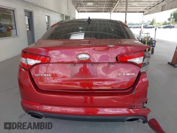 ✅ 2012 Kia Optima EX • VIN: 5XXGN4A64CG014206 • Lot: 42700120. Listed on IAAI with 121,802 mi. Free auction sales archive from the USA and detailed vehicle history report at DreamBid. Image 16.