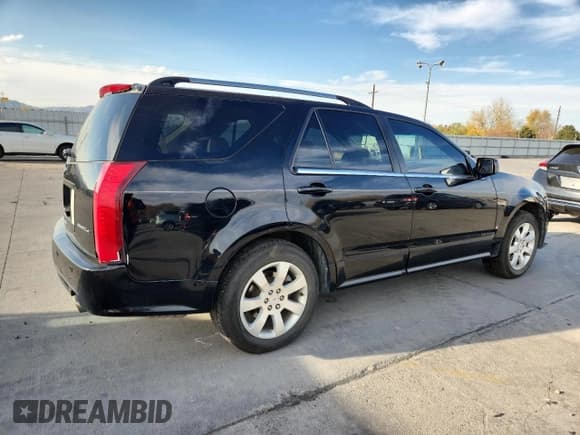 ✅ 2009 Cadillac SRX AWD • VIN: 1GYEE437390104416 • Lot: 90649745. Listed on Copart with 152,982 mi. Free auction sales archive from the USA and detailed vehicle history report at DreamBid. Image 3.
