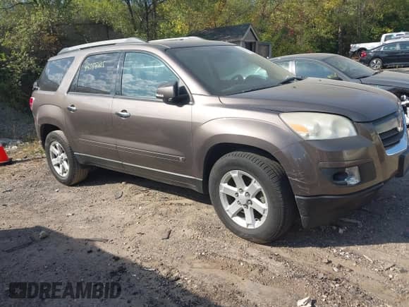 2010 Saturn Outlook XE z VIN 5GZLRTED1AJ127236, wystawiony jako IAAI lot #43358815 z przebiegiem Nie podano mil oraz . Historia ofert i sprzedaży dostępna na DreamBid. Obrazek 1.