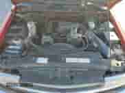 2000 Chevrolet Blazer LT z VIN 1GNDT13W1Y2272773, wystawiony jako Copart lot #88475175 z przebiegiem 197 171 mil mil oraz Szkoda całkowita • Salvage title. Historia ofert i sprzedaży dostępna na DreamBid. Obrazek 12.