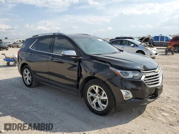 ✅ 2020 Chevrolet Equinox Premier • VIN: 2GNAXNEV7L6275482 • Lot: 87413015. Listed on Copart with 93,079 mi. Free auction sales archive from the USA and detailed vehicle history report at DreamBid. Image 4.