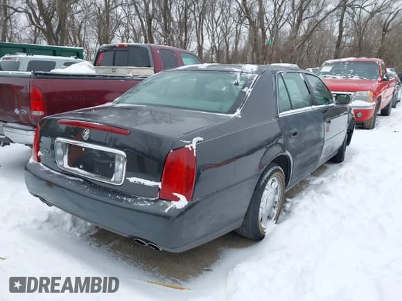✅ 2001 Cadillac DeVille • VIN: 1G6KD54Y31U259475 • Lot: 41566992. Listed on IAAI with Not provided. Free auction sales archive from the USA and detailed vehicle history report at DreamBid. Image 4.