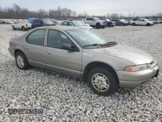 ✅ 1999 Dodge Stratus • VIN: 1B3EJ46XXXN678669 • Lot: 81815314. Listed on Copart with 102,413 mi. Free auction sales archive from the USA and detailed vehicle history report at DreamBid. Image 4.