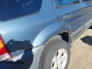 ✅ 2005 Ford Escape XLT • VIN: 1FMYU93105KA21695 • Lot: 43859811. Listed on IAAI with 211,745 mi. Free auction sales archive from the USA and detailed vehicle history report at DreamBid. Image 12.