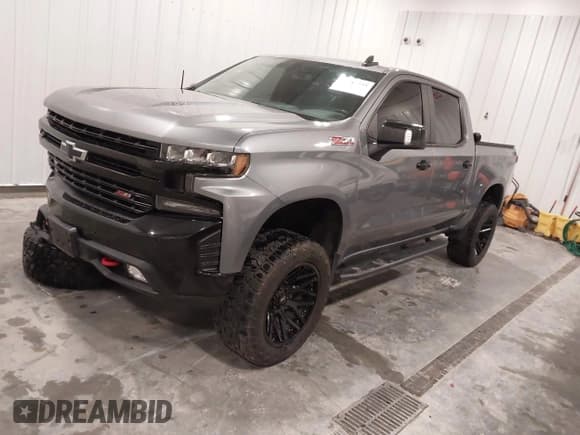 ✅ 2021 Chevrolet Silverado 1500 LT Trail Boss • VIN: 1GCPYFEL2MZ261063 • Лот: 43743393. Опубликован ранее на IAAI с пробегом 76 396 миль. Бесплатный доступ к архиву аукционных продаж из США и подробный отчёт об истории автомобиля на DreamBid. Изображение 2.