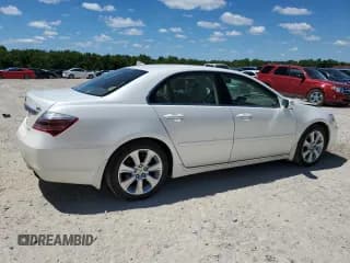 ✅ 2009 Acura RL Technology • VIN: JH4KB26699C002401 • Лот: 58220024. Опубликован ранее на Copart с пробегом 206 133 миль. Бесплатный доступ к архиву аукционных продаж из США и подробный отчёт об истории автомобиля на DreamBid. Изображение 3.