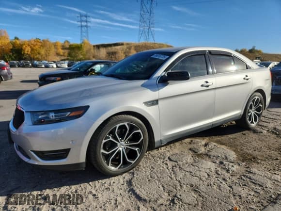 ✅ 2013 Ford Taurus SHO • VIN: 1FAHP2KT1DG112634 • Lot: 89816735. Listed on Copart with 124,134 mi. Free auction sales archive from the USA and detailed vehicle history report at DreamBid. Image 1.