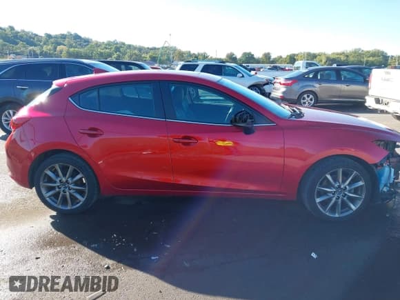 ✅ 2018 Mazda 3 Grand Touring • VIN: 3MZBN1M31JM223311 • Lot: 43459553. Listed on IAAI with 91,981 mi. Free auction sales archive from the USA and detailed vehicle history report at DreamBid. Image 14.