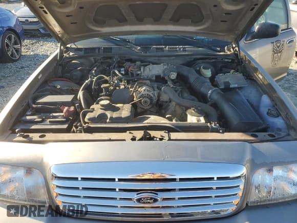 ✅ 2005 Ford Police Interceptor • VIN: 2FAFP71W95X164931 • Lot: 90994005. Listed on Copart with 168,289 mi. Free auction sales archive from the USA and detailed vehicle history report at DreamBid. Image 11.