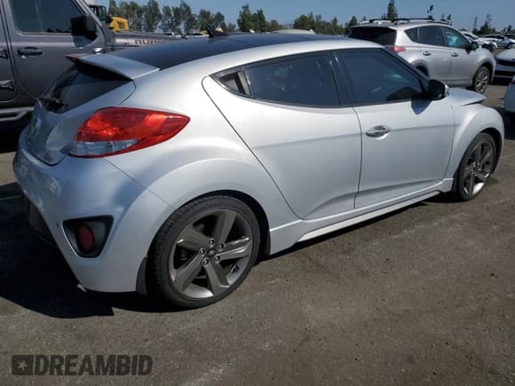 ✅ 2014 Hyundai Veloster Turbo • VIN: KMHTC6AE2EU191482 • Lot: 71857614. Wystawiony na Copart z przebiegiem 102 802 mil. Bezpłatny archiwum sprzedaży aukcyjnych z USA i szczegółowy raport historii pojazdu na DreamBid. Zdjęcie 3.