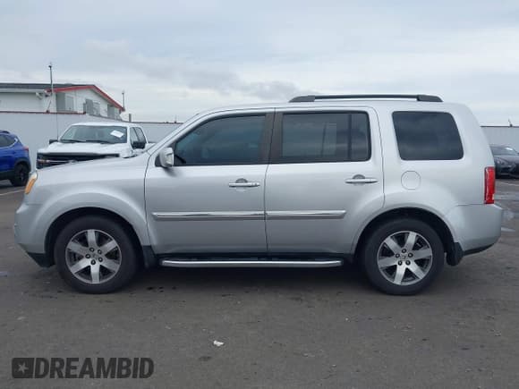 ✅ 2013 Honda Pilot Touring • VIN: 5FNYF4H97DB064748 • Lot: 43607982. Listed on IAAI with 140,066 mi. Free auction sales archive from the USA and detailed vehicle history report at DreamBid. Image 15.