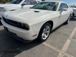 ✅ 2009 Dodge Challenger SE • VIN: 2B3LJ44VX9H623305 • Lot: 77859084. Wystawiony na Copart z przebiegiem 137 341 mil. Bezpłatny archiwum sprzedaży aukcyjnych z USA i szczegółowy raport historii pojazdu na DreamBid. Zdjęcie 2.