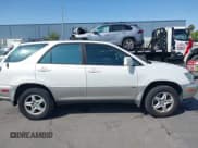 ✅ 2003 Lexus RX 300 • VIN: JTJGF10U330151793 • Лот: 42437285. Опубликован ранее на IAAI с пробегом 252 619 миль. Бесплатный доступ к архиву аукционных продаж из США и подробный отчёт об истории автомобиля на DreamBid. Изображение 13.