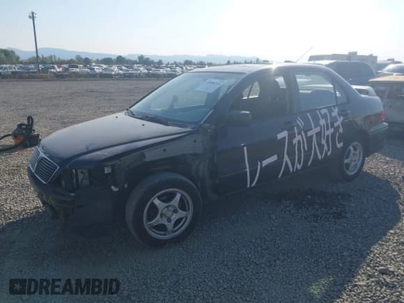 ✅ 2003 Mitsubishi Lancer OZ-Rally • VIN: JA3AJ86E43U091658 • Lot: 43090214. Wystawiony na IAAI z przebiegiem 288 081 mil. Bezpłatny archiwum sprzedaży aukcyjnych z USA i szczegółowy raport historii pojazdu na DreamBid. Zdjęcie 2.