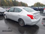 ✅ 2013 Nissan Versa SV • VIN: 3N1CN7AP2DL889432 • Lot: 43603629. Listed on IAAI with 138,553 mi. Free auction sales archive from the USA and detailed vehicle history report at DreamBid. Image 3.