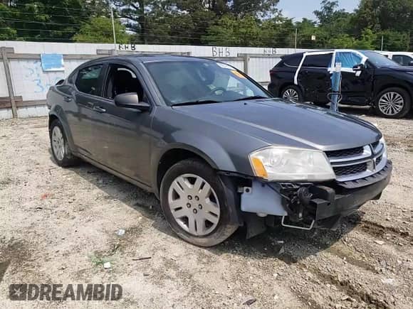 2013 Dodge Avenger SE с VIN 1C3CDZABXDN593904, выставлен на аукционе Copart как лот 62848555 с пробегом Не указан миль и Списание • Salvage title. История ставок и продаж доступна на DreamBid. Изображение 13.