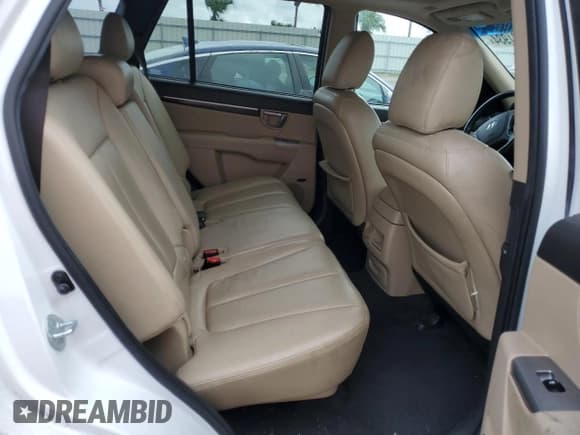 ✅ 2012 Hyundai Santa Fe Limited • VIN: 5XYZKDAG1CG143185 • Lot: 74531934. Listed on Copart with 186,312 mi. Free auction sales archive from the USA and detailed vehicle history report at DreamBid. Image 10.