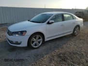 ✅ 2014 Volkswagen Passat SEL Premium • VIN: 1VWCT7A30EC006308 • Lot: 68648595. Wystawiony na Copart z przebiegiem 100 077 mil. Bezpłatny archiwum sprzedaży aukcyjnych z USA i szczegółowy raport historii pojazdu na DreamBid. Zdjęcie 1.