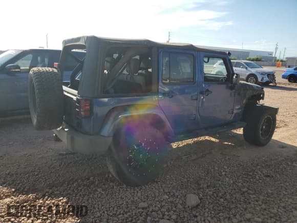 ✅ 2009 Jeep Wrangler Unlimited Sahara • VIN: 1J4GA59159L713079 • Lot: 68146845. Listed on Copart with Not provided. Free auction sales archive from the USA and detailed vehicle history report at DreamBid. Image 3.