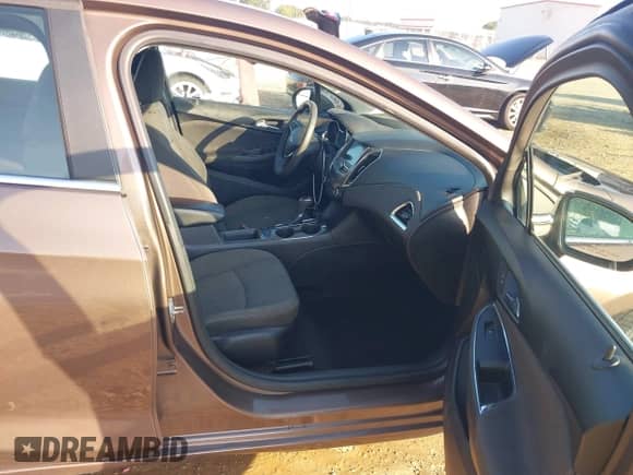 2019 Chevrolet Cruze LT with VIN 1G1BE5SM3K7137024, listed as a IAAI auction lot 43209295 with 90,633 mi miles and . Bid and sale history available at DreamBid. Image 5.