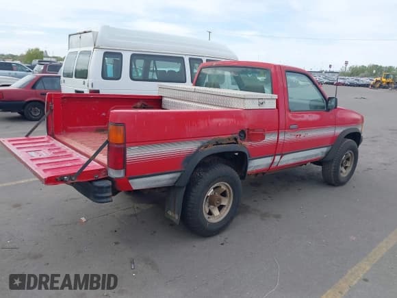 ✅ 1992 Nissan Frontier XE • VIN: 1N6SD11Y3NC326014 • Lot: 42115936. Listed on IAAI with 196,493 mi. Free auction sales archive from the USA and detailed vehicle history report at DreamBid. Image 4.
