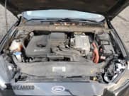 ✅ 2013 Ford Fusion Titanium Hybrid • VIN: 3FA6P0RU5DR368519 • Lot: 93022625. Wystawiony na Copart z przebiegiem 123 902 mil. Bezpłatny archiwum sprzedaży aukcyjnych z USA i szczegółowy raport historii pojazdu na DreamBid. Zdjęcie 11.