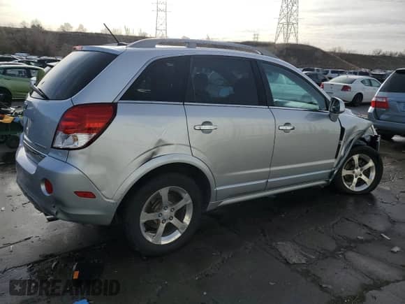 2012 Chevrolet Captiva Sport LTZ с VIN 3GNFL4E56CS641722, выставлен на аукционе Copart как лот 84938944 с пробегом 119 925 миль миль и Списание • Salvage title. История ставок и продаж доступна на DreamBid. Изображение 3.