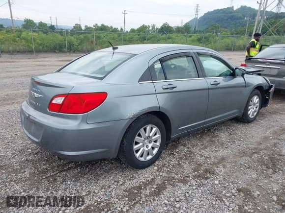 ✅ 2009 Chrysler Sebring LX • VIN: 1C3LC46B49N514524 • Lot: 42697008. Listed on IAAI with 103,947 mi. Free auction sales archive from the USA and detailed vehicle history report at DreamBid. Image 4.
