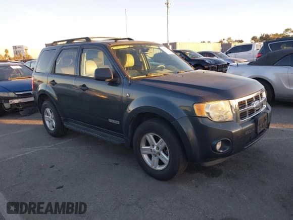 ✅ 2008 Ford Escape Hybrid • VIN: 1FMCU49H68KA77890 • Лот: 43863343. Опубликован ранее на IAAI с пробегом 159 338 миль. Бесплатный доступ к архиву аукционных продаж из США и подробный отчёт об истории автомобиля на DreamBid. Изображение 1.